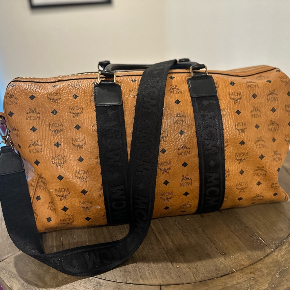 MCM Tan and Black Duffel Bag with Monogram Design